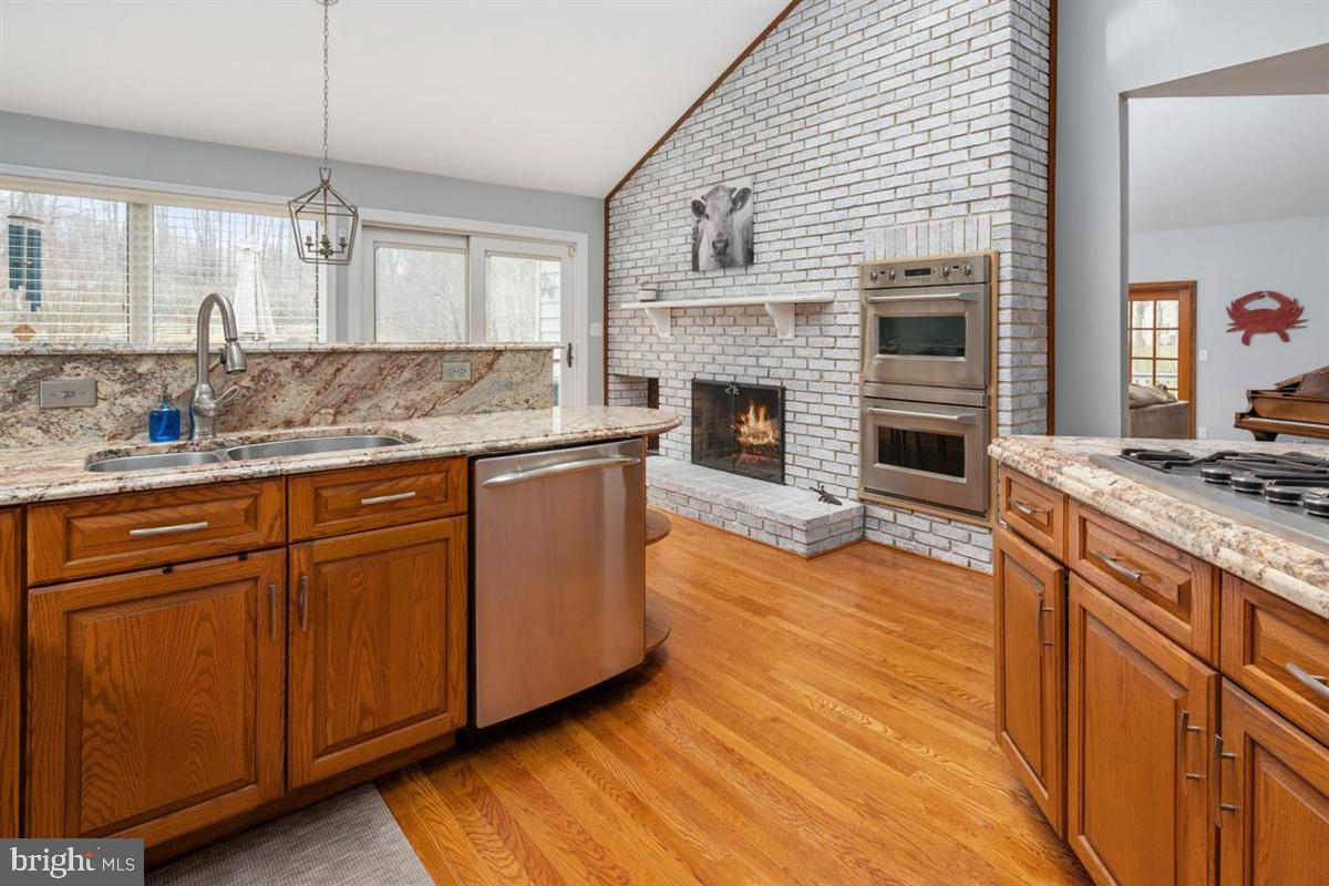 1937 High Ridge Road Annapolis, MD 21409 - Photo 8 of 64 Double oven next to great wood burning fireplace