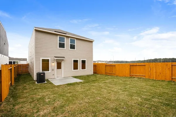 a house view with a backyard space