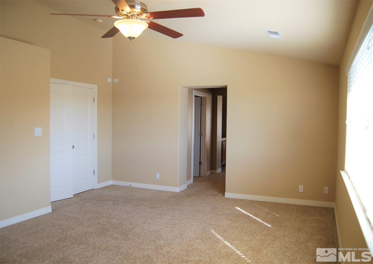 2900 Sandestin Drive Reno, NV 89523 - Photo 17 of 24 an empty room with a window and a fan