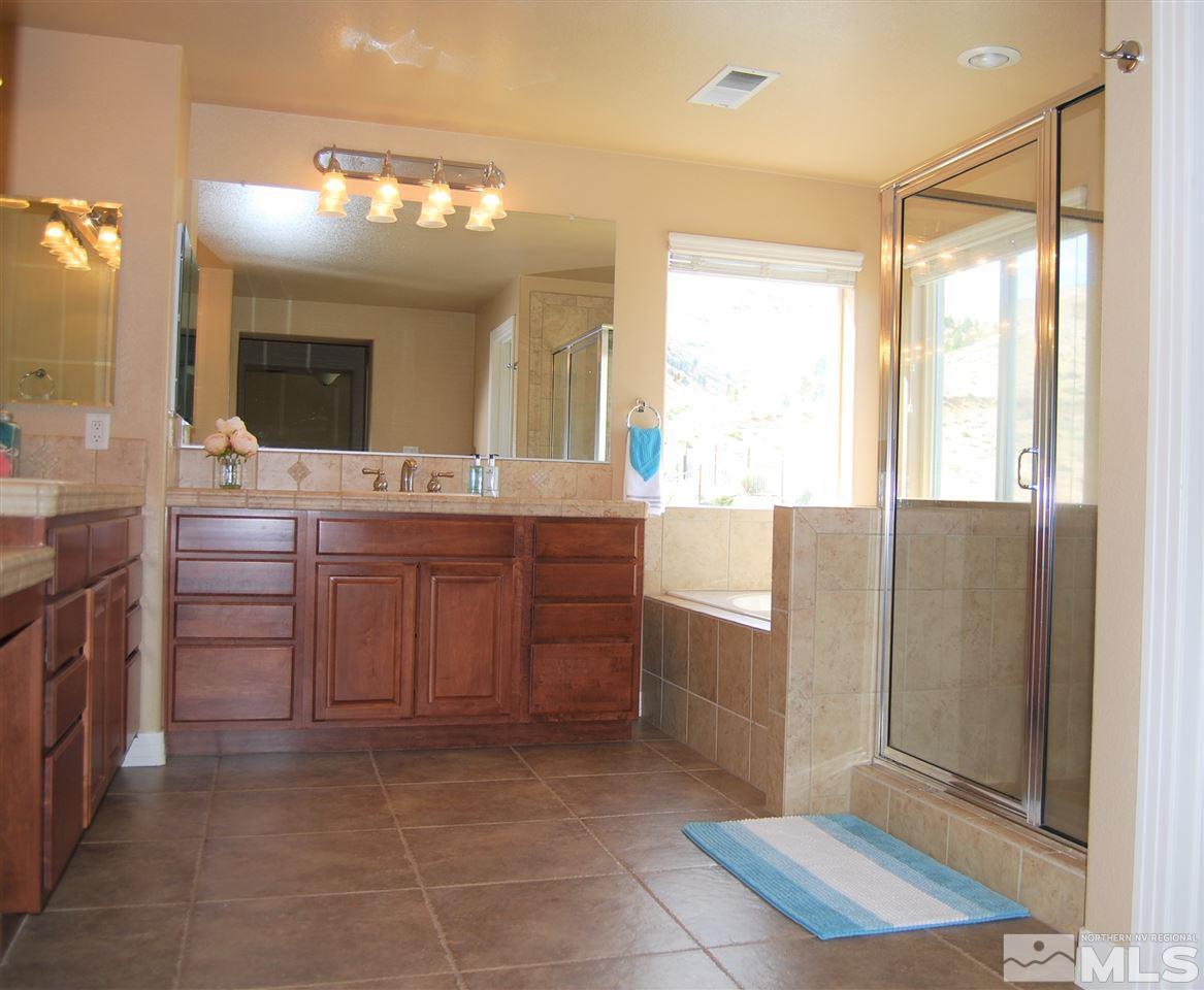 2900 Sandestin Drive Reno, NV 89523 - Photo 20 of 24 a bathroom with a sink vanity and mirror