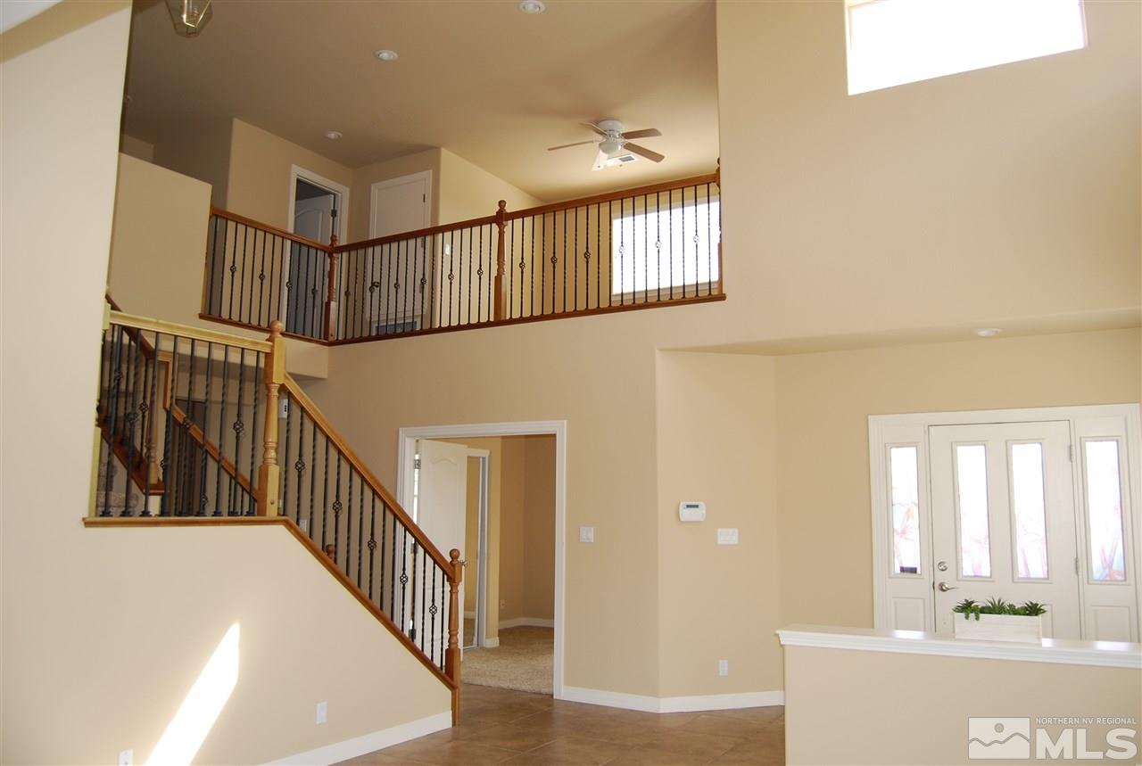 2900 Sandestin Drive Reno, NV 89523 - Photo 6 of 24 a view of entryway and hall with wooden floor