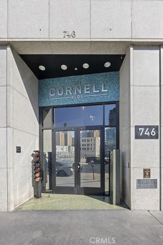 a black and white kitchen with a sink