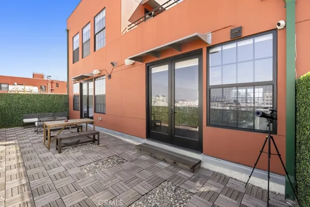 a view of a chairs and table on the terrace