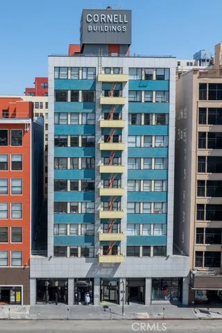 a front view of a building with a street