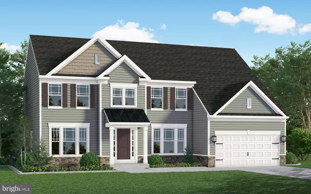 front view of a house and a yard