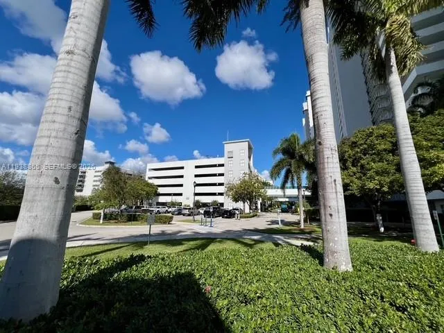 a view of balcony with two chairs and a table
