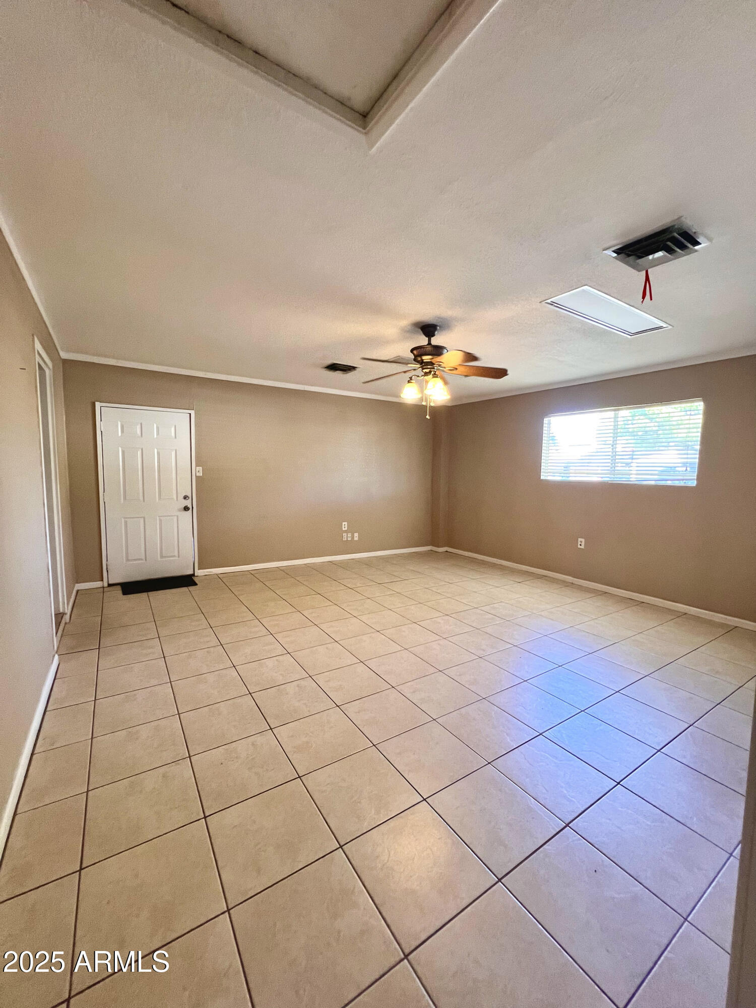121 East Olive Avenue Gilbert, AZ 85234 - Photo 15 of 25 a view of an empty room and window