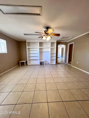 a bathroom with a sink and mirror with toilet