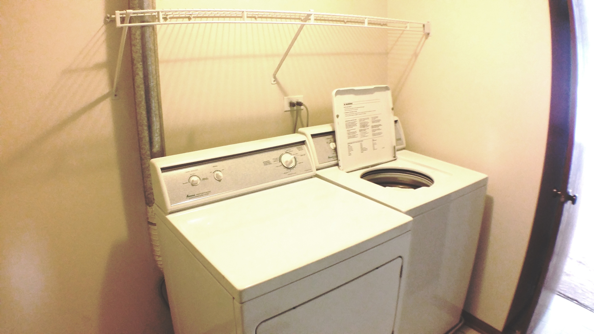 1934 Heron Avenue, Unit D Schaumburg, IL 60193 - Photo 15 of 20 a utility room with dryer and washer