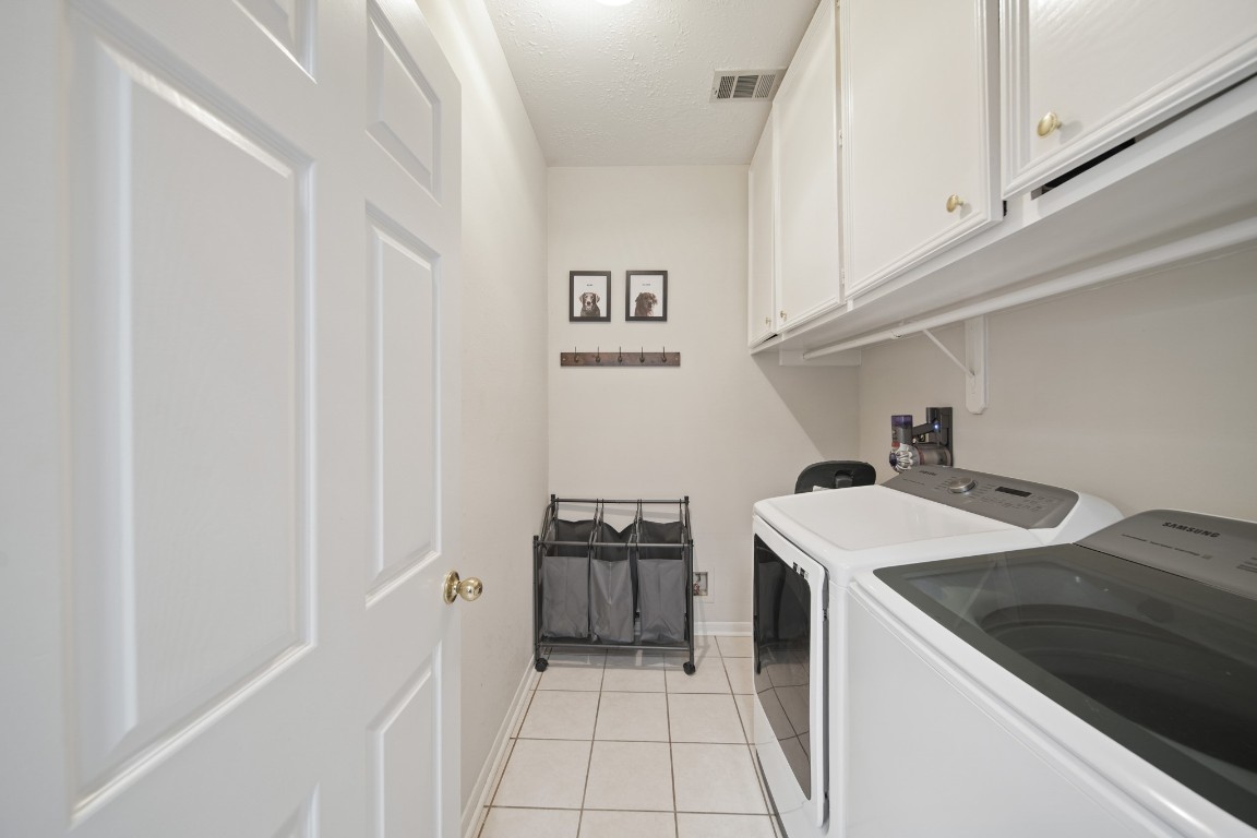 16114 Kintyre Point Road Houston, TX 77095 - Photo 27 of 41 a utility room with washer and dryer