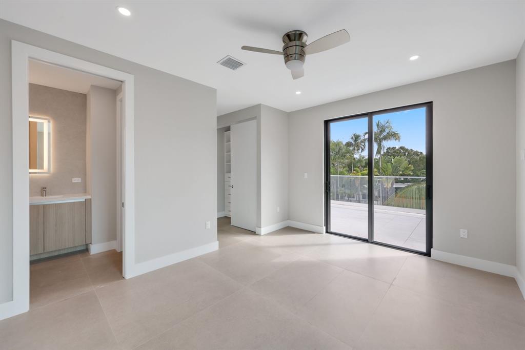 2015 Northeast 4th Avenue Wilton Manors, FL 33305 - Photo 50 of 79 a view of an empty room with a window