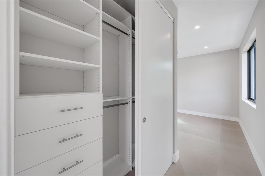 2015 Northeast 4th Avenue Wilton Manors, FL 33305 - Photo 57 of 79 a view of an empty walk in closet