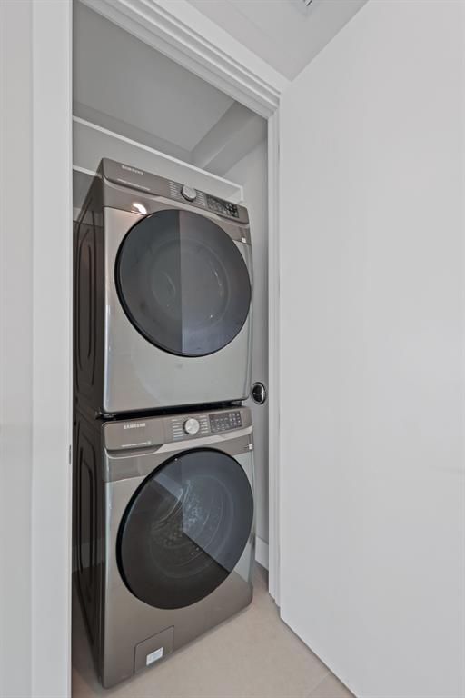 2015 Northeast 4th Avenue Wilton Manors, FL 33305 - Photo 60 of 79 a utility room with dryer and washer