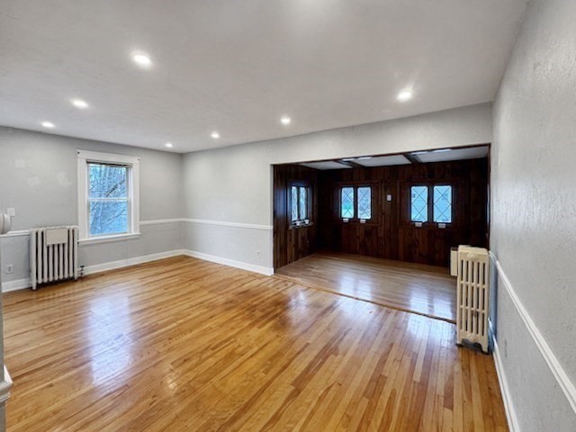 80 Delmont Avenue Worcester, MA 01604 - Photo 18 of 35 a view of empty room with wooden floor and fan