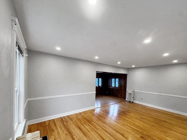 80 Delmont Avenue Worcester, MA 01604 - Photo 19 of 35 a view of empty room with wooden floor