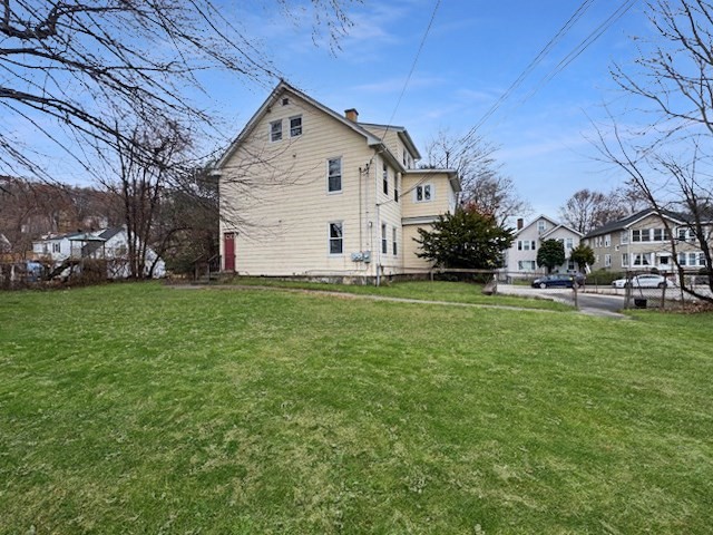 80 Delmont Avenue Worcester, MA 01604 - Photo 34 of 35 a front view of house with yard and green space