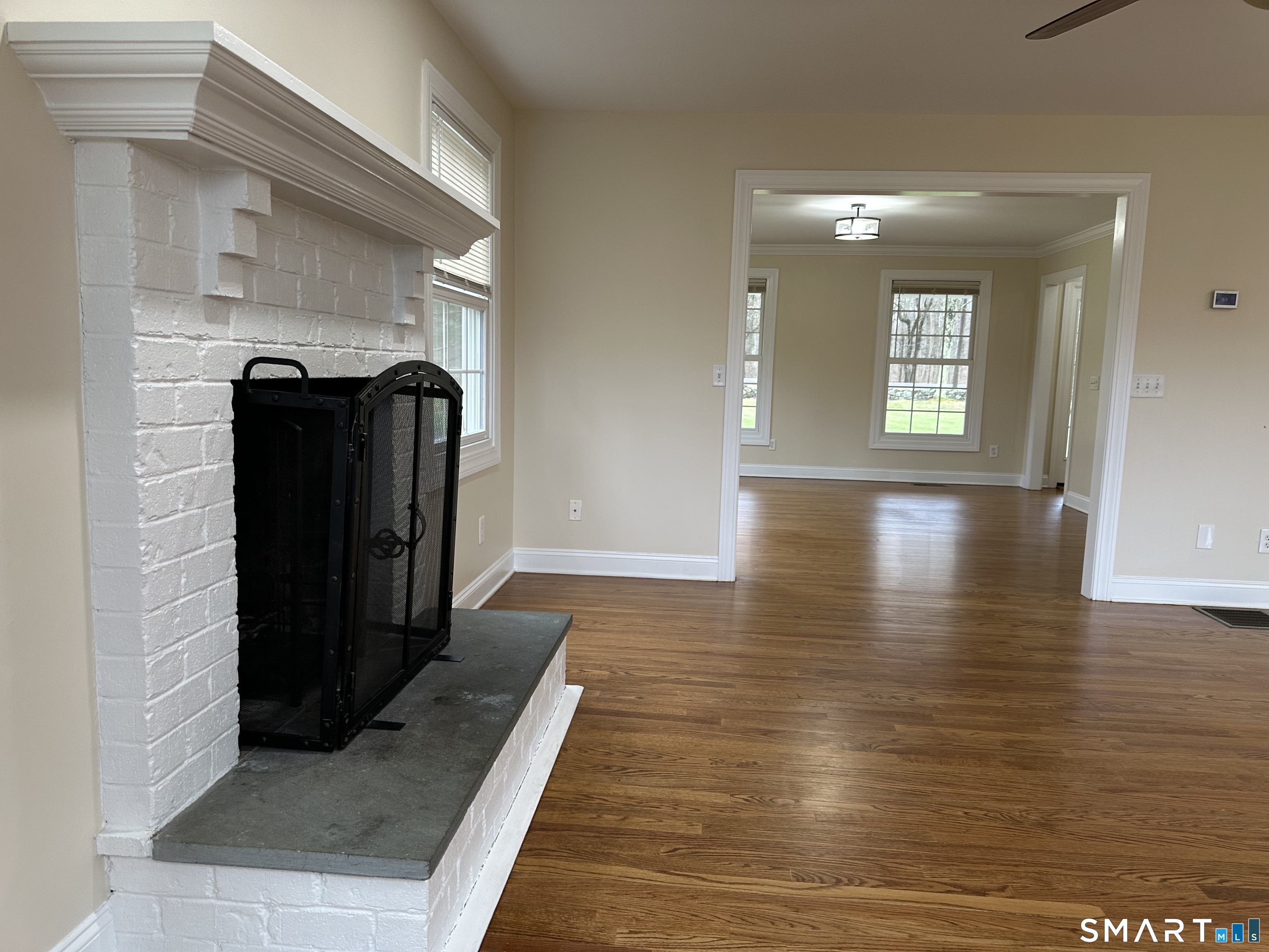 128 Center Road Easton, CT 06612 - Photo 10 of 39 Living room with fireplace