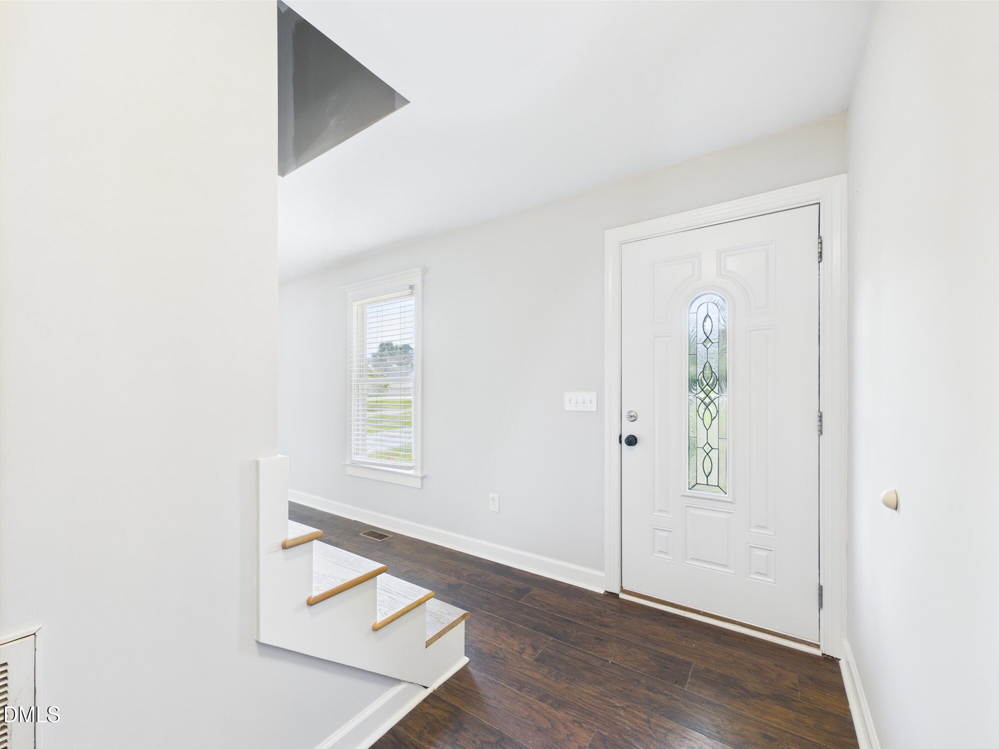 10917 Fanny Brown Road Raleigh, NC 27603 - Photo 12 of 54 a view of an entryway with wooden floor