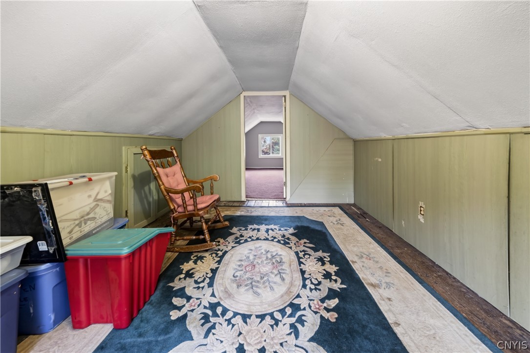5506 Bear Road Clay, NY 13212 - Photo 23 of 36 The loft leads to a third bedroom.