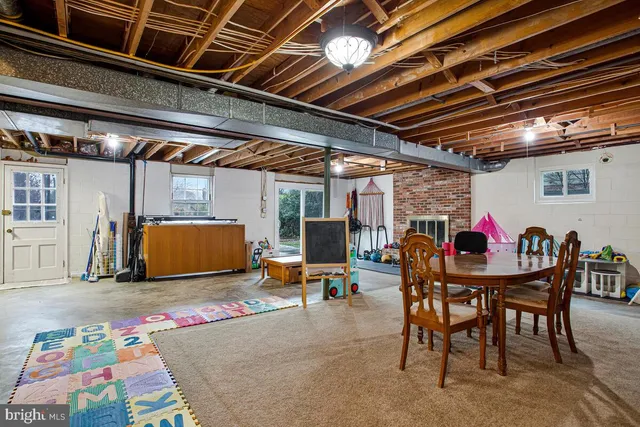 a view of outdoor space with table and chairs