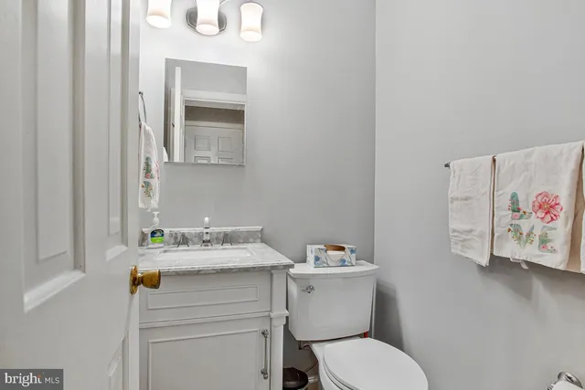 a living room with furniture fireplace and a fireplace