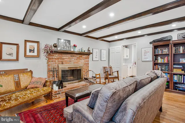 a kitchen with cabinets a window and appliances