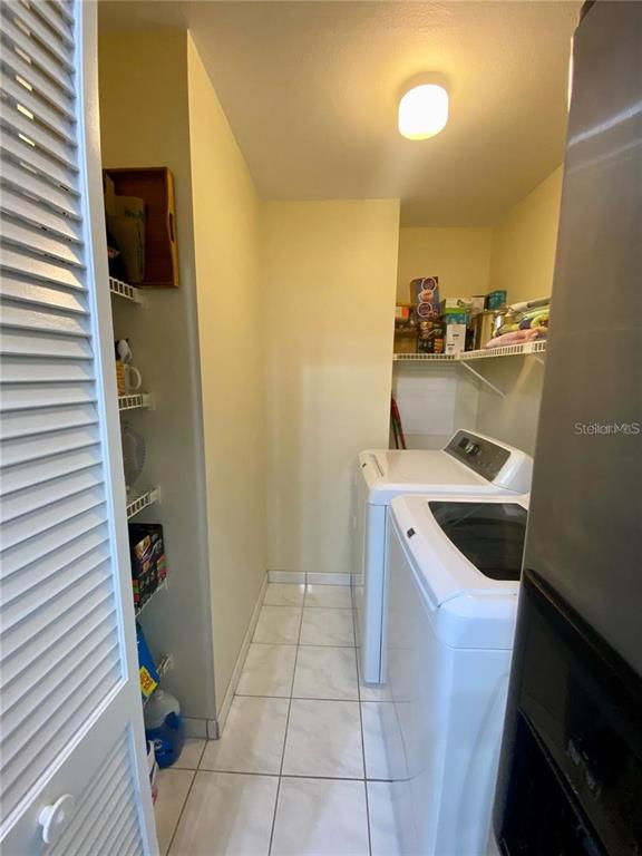 103 Cypress Pond Road, Unit 103 Palm Harbor, FL 34683 - Photo 8 of 52 a bathroom with a sink and toilet