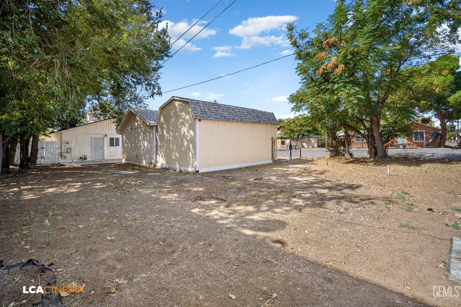 Undisclosed Address Bakersfield, CA 93305 - Photo 17 of 20 a view of a house with a snow in the yard