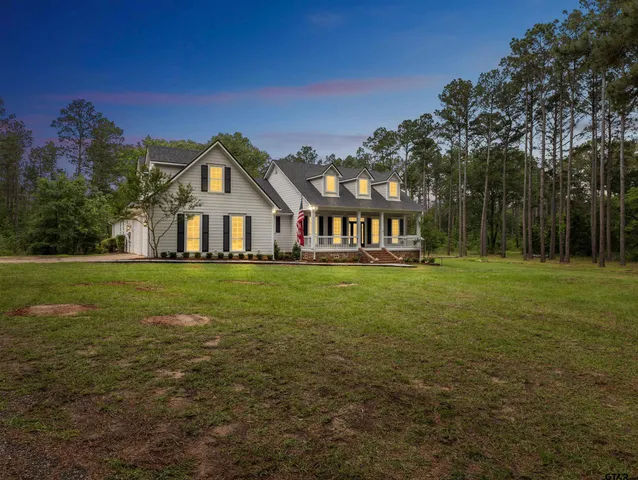 a house view with garden space