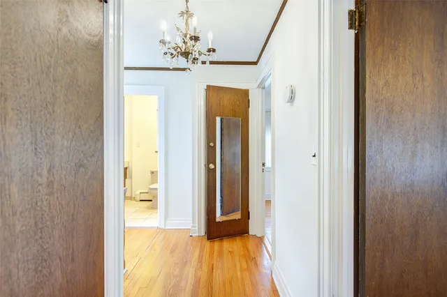 a view of a bedroom from a hallway