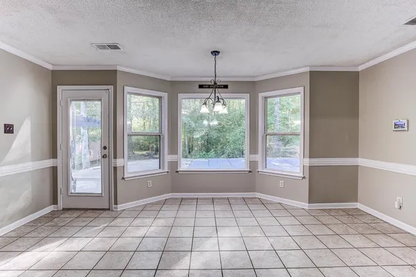 a view of an empty room with window