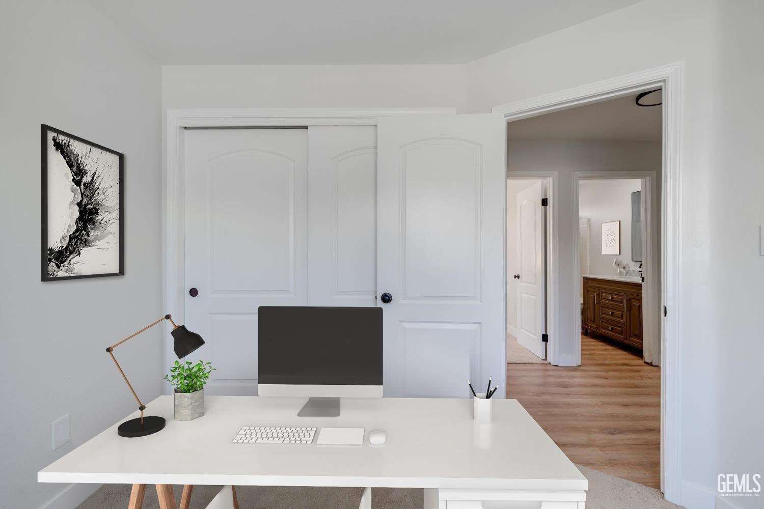 Undisclosed Address Bakersfield, CA 93307 - Photo 9 of 14 a workspace with furniture and bathroom