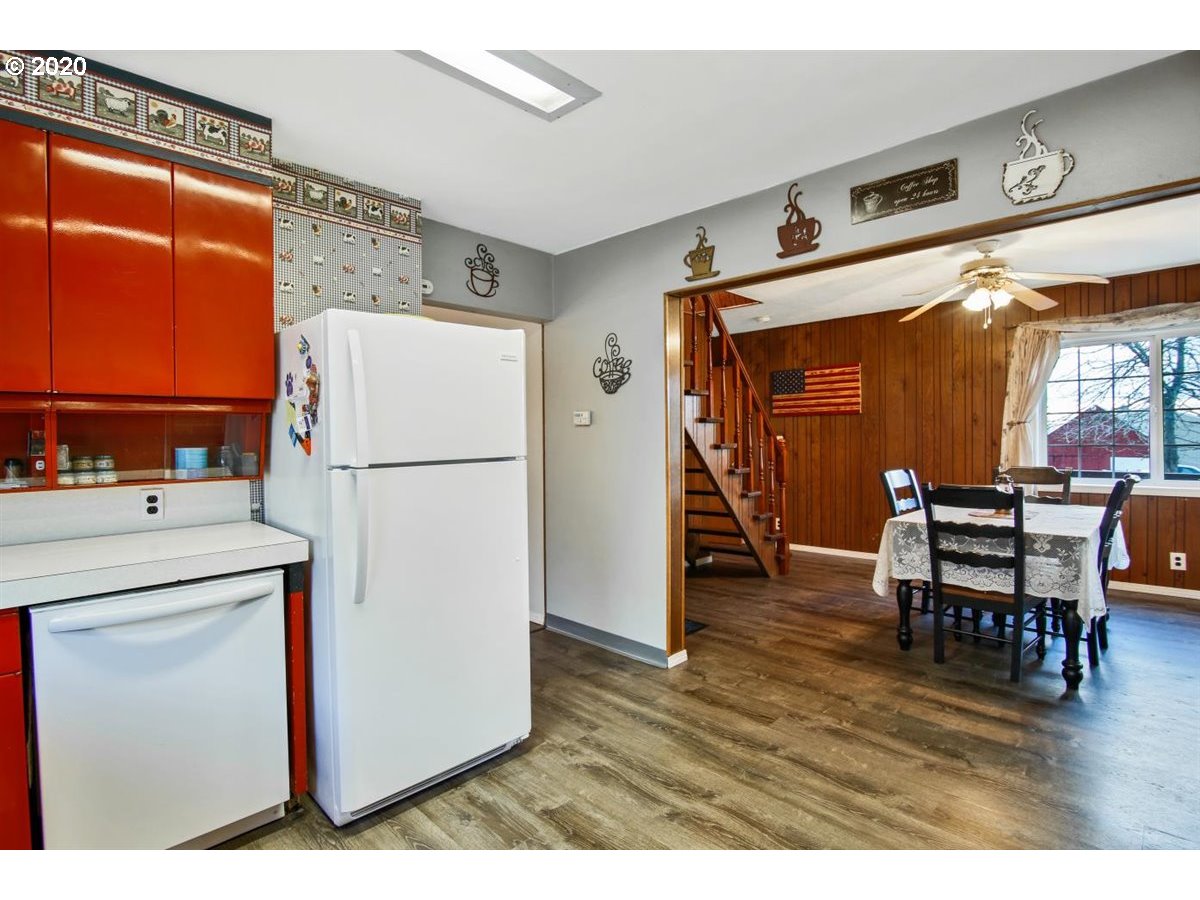 37161 Southeast Trubel Road Sandy, OR 97055 - Photo 13 of 27 a kitchen with refrigerator and table