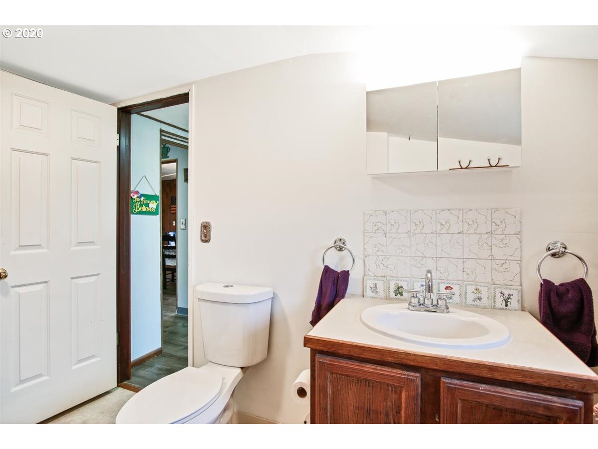 37161 Southeast Trubel Road Sandy, OR 97055 - Photo 19 of 27 a bathroom with a sink toilet and shower
