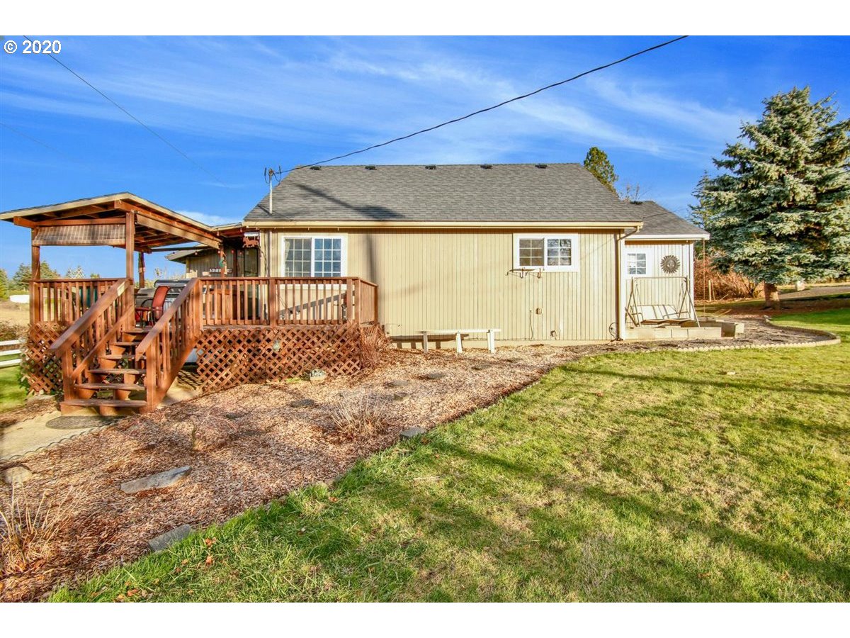 37161 Southeast Trubel Road Sandy, OR 97055 - Photo 3 of 27 a front view of a house with a yard