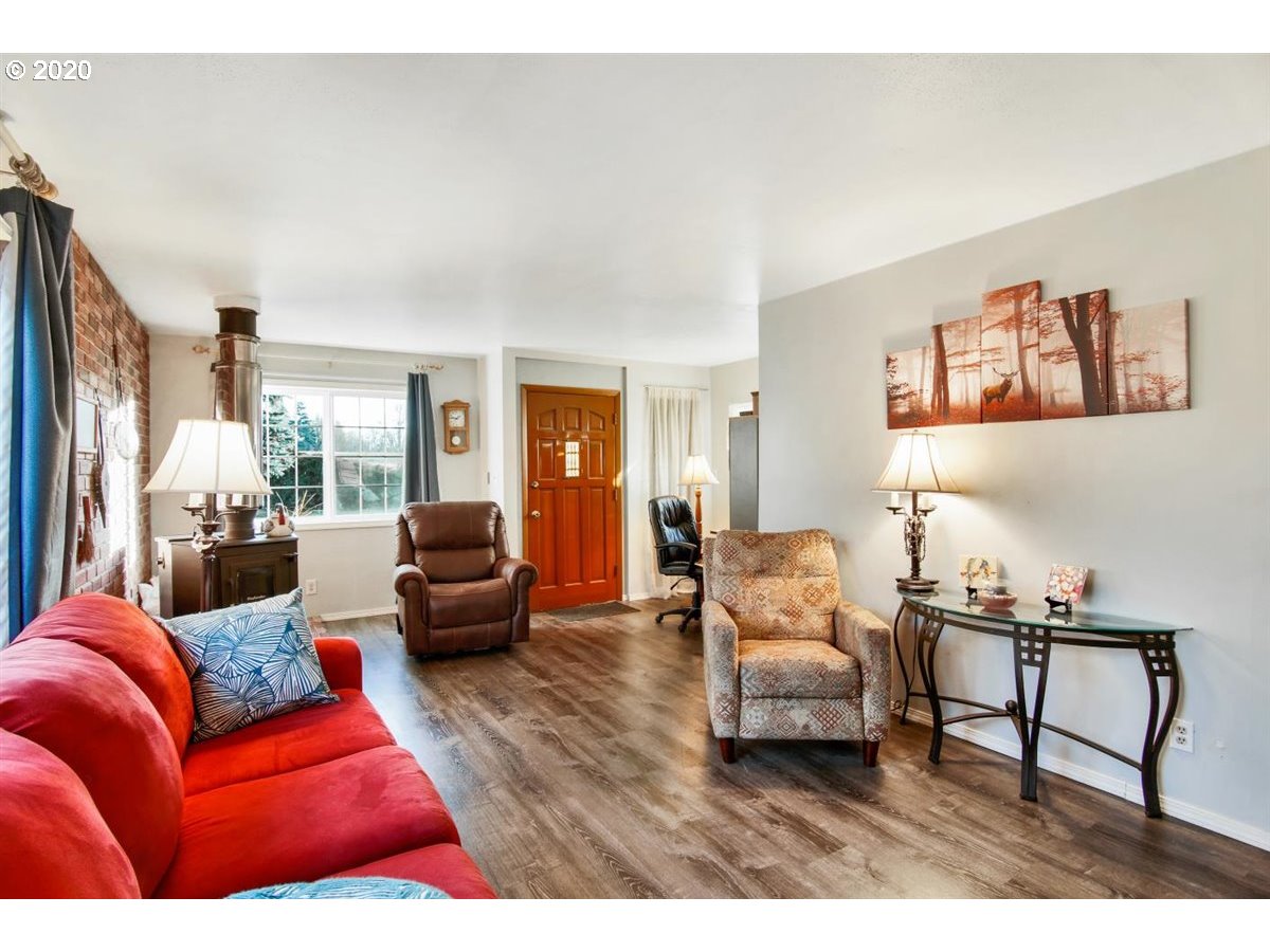 37161 Southeast Trubel Road Sandy, OR 97055 - Photo 10 of 27 a living room with furniture and a large window