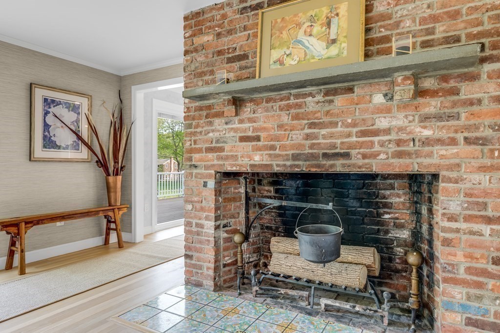 3 Longmeadow Way Hamilton, MA 01982 - Photo 15 of 41 a close view of a fireplace with wooden floor