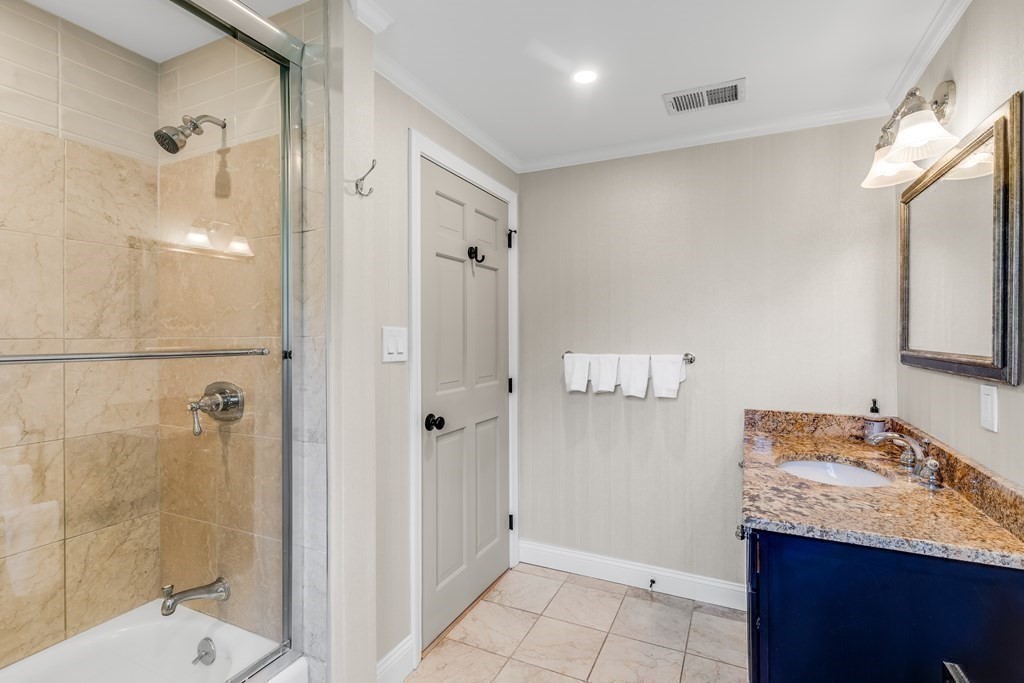 3 Longmeadow Way Hamilton, MA 01982 - Photo 24 of 41 a bathroom with a granite countertop sink a shower and a mirror