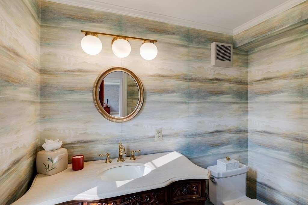 3 Longmeadow Way Hamilton, MA 01982 - Photo 9 of 41 a bathroom with a granite countertop toilet sink and mirror