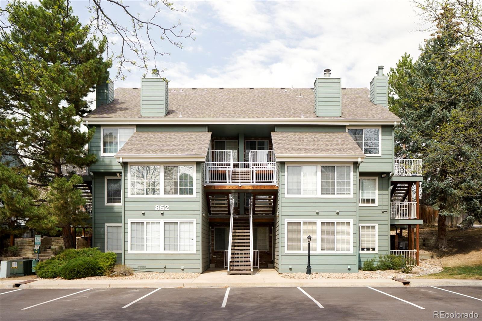 862 South Reed Court, Unit J Lakewood, CO 80226 - Photo 1 of 37 front view of a house