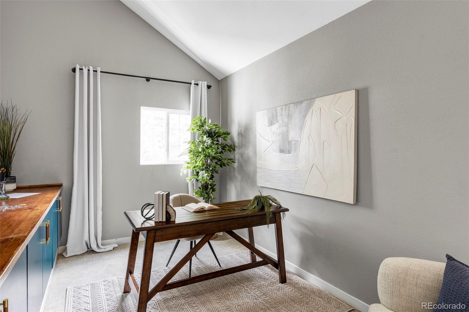 862 South Reed Court, Unit J Lakewood, CO 80226 - Photo 21 of 37 a workspace with furniture and a potted plant