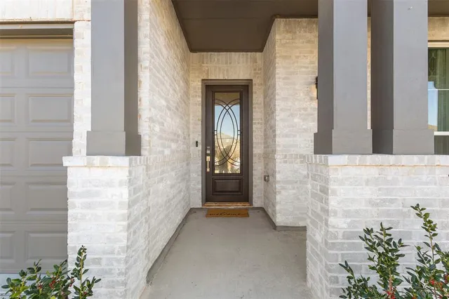 a kitchen with stainless steel appliances sink refrigerator and cabinets