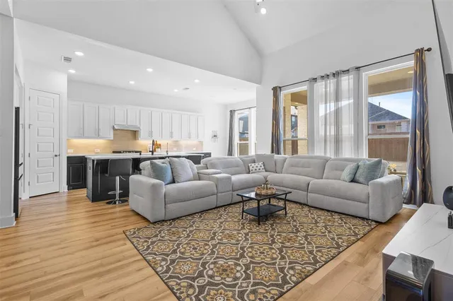 a living room with furniture and a couch