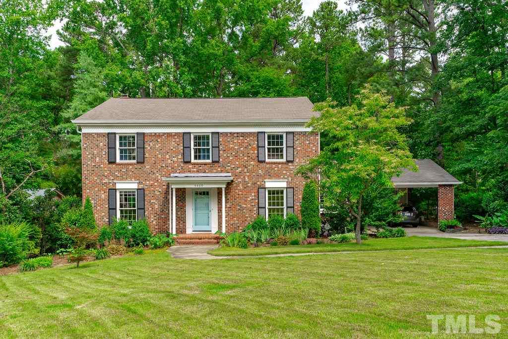 Four sided brick charming home with huge private bakyard!