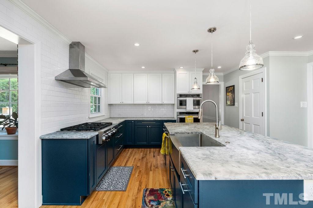 5409 Alpine Drive Raleigh, NC 27609 - Photo 11 of 30 With SS farm sink and 6 gas burner cooktop!
