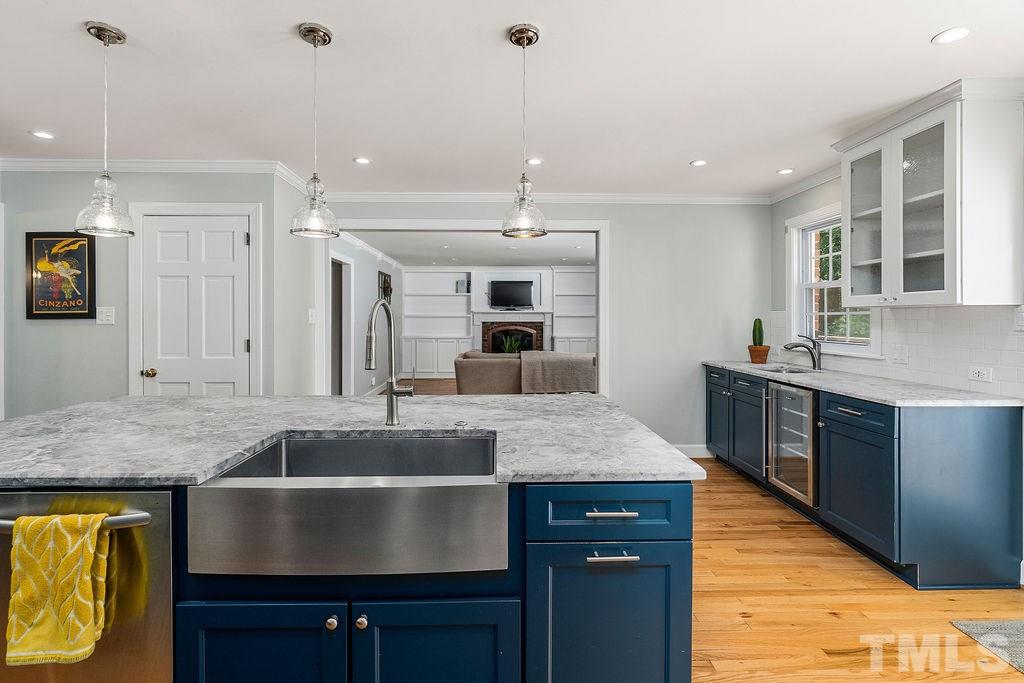 5409 Alpine Drive Raleigh, NC 27609 - Photo 13 of 30 Huge island, lots of counter space and cabinets!