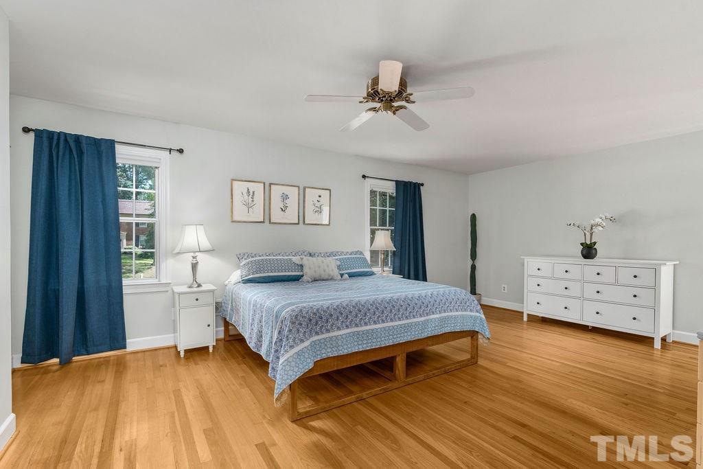 5409 Alpine Drive Raleigh, NC 27609 - Photo 18 of 30 Spacious master bedroom with WIC and updated master bathroom!