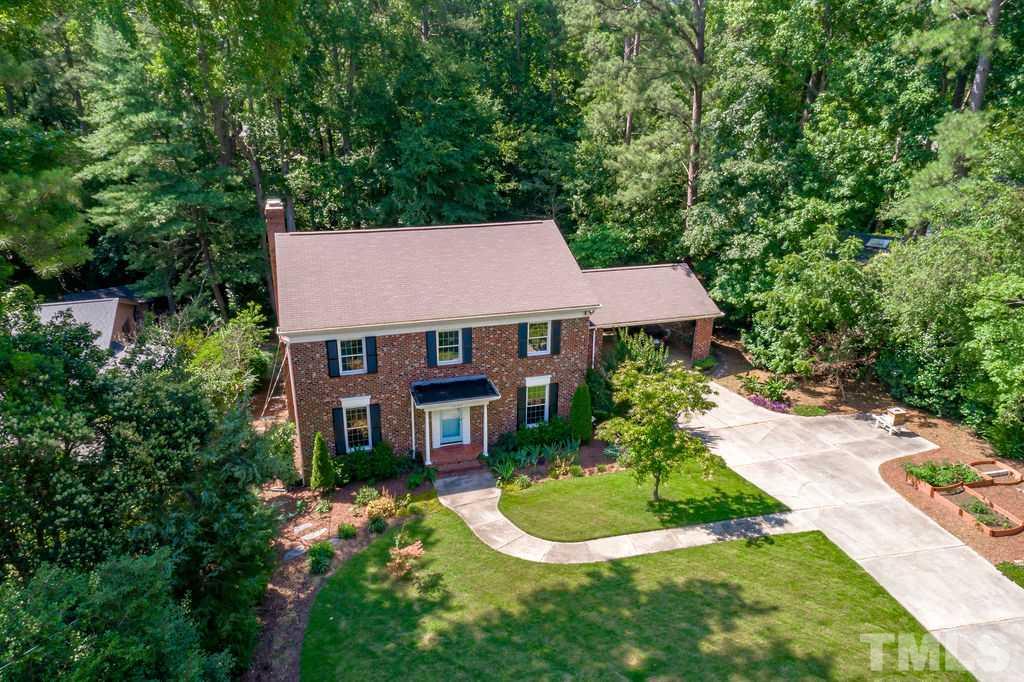 5409 Alpine Drive Raleigh, NC 27609 - Photo 27 of 30 Ahhhh surrounded by trees and lovely landscaping!