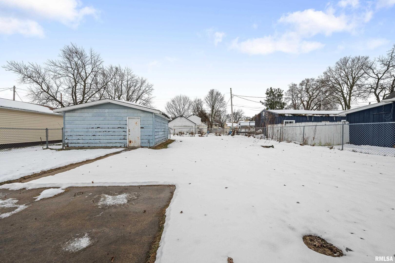 617 6th Street Camanche, IA 52730 - Photo 22 of 25 a view of snow on the roof