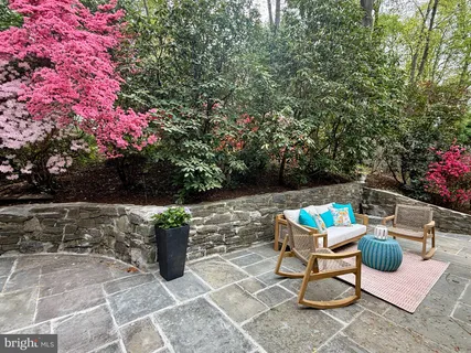 a backyard of a house with seating space